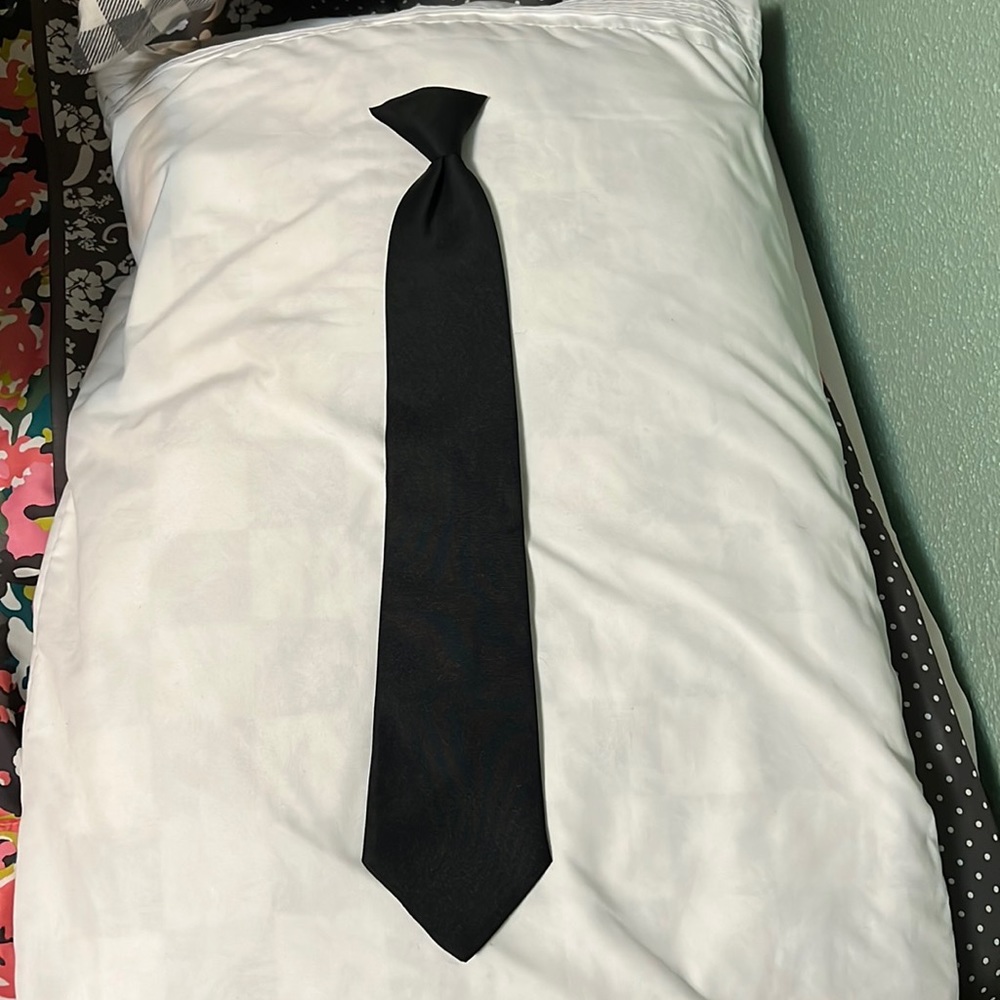 Black click on tie